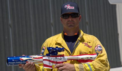 Firefighter displaying innovative equipment