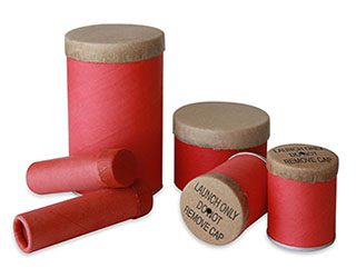 Red cardboard tubes with brown caps