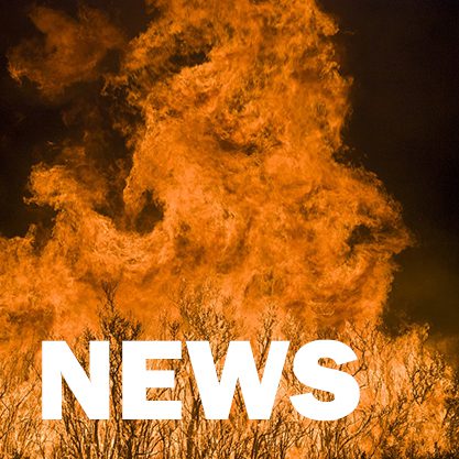 Intense flames behind "NEWS" headline